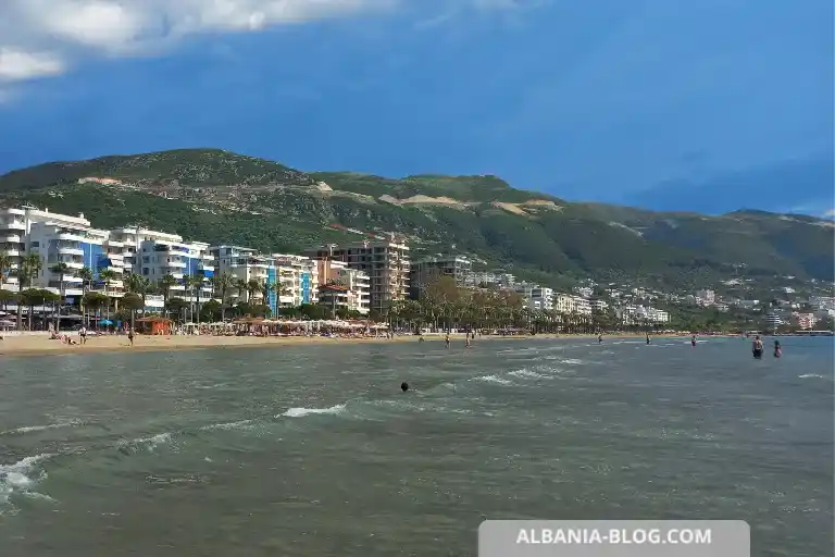 Lungomare coastline in Vlore with sea, white hotels and mountains near Sea Side hotel