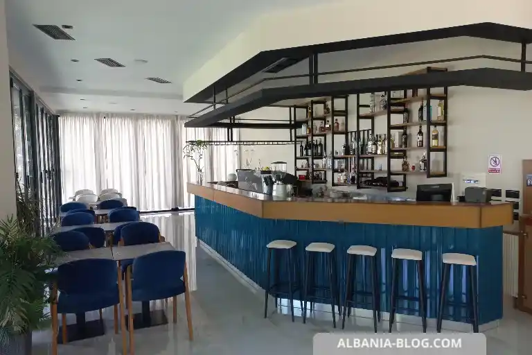 Hotel bar at Valza Boutique Hotel Vlore with warm lighting and garden access