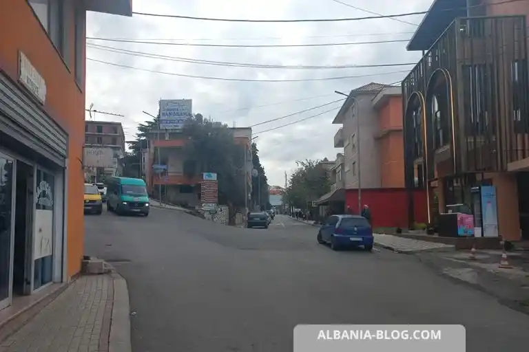 Minibus boarding point from Kruja to Fush-Kruje at a street intersection